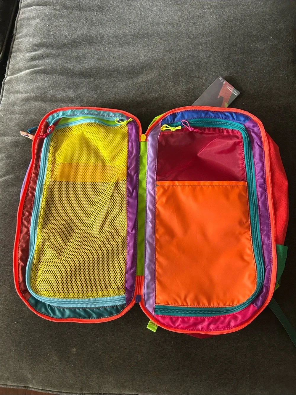 cotopaxi purple green orange small backpack